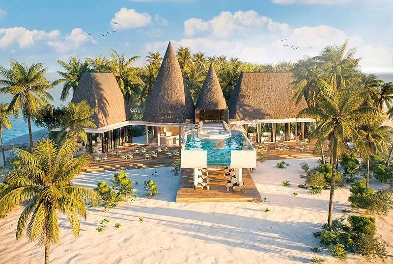 Pogled na moderno arhitekturo resorta Meyyafushi Maldives s peščene plaže